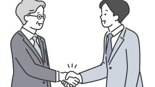 握手する上司と部下